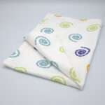 Magic design tea towel folded from hem and tassel