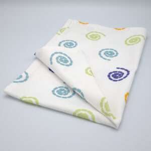 Magic design tea towel folded from hem and tassel