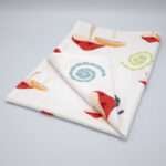 Magic mushroom design tea towel folded from hem and tassel