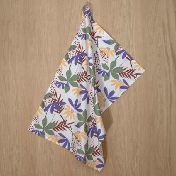 Pollen Up design hanging tea towel in purple from hem and tassel