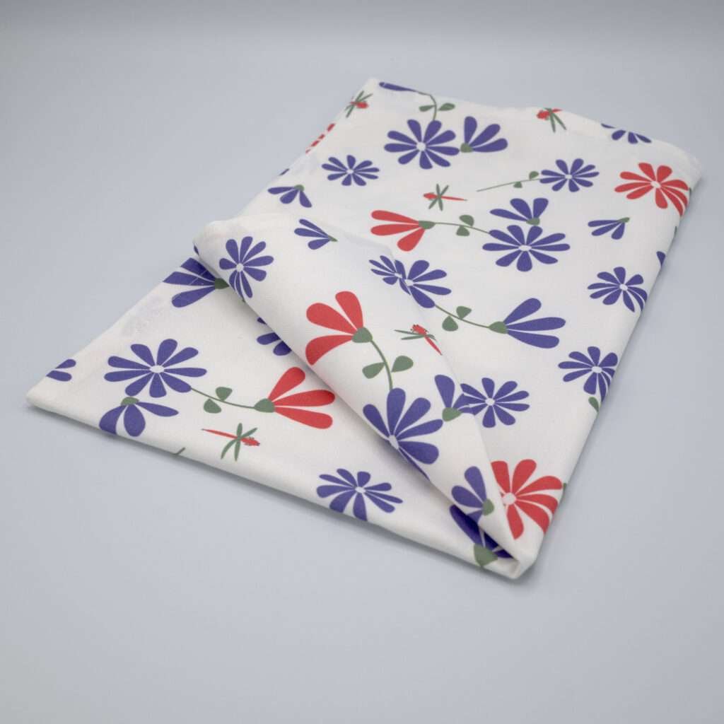 kitchen towel in shy dragonfly hiding design with purple and pink flowers