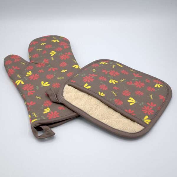 Shy dragonfly design mitt and pocketed hot pad in clay from hem and tassel