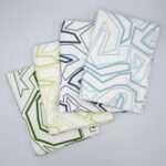 Squiggles geometry design four tea towels fanned from hem and tassel
