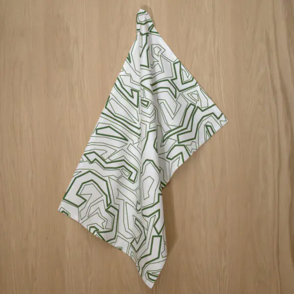 Squiggles geometry design hanging tea towel in green from hem and tassel