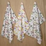 Thingies design set of three hanging tea towels from hem and tassel