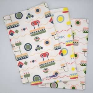 Thingies design set of three tea towels fanned from hem and tassel