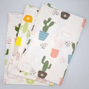 Thorny issue design set of three tea towels fanned from hem and tassel