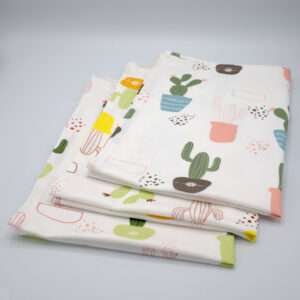 Thorny issue design set of three tea towels folded from hem and tassel