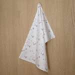 Tiny countryside design hanging tea towel in grey from hem and tassel