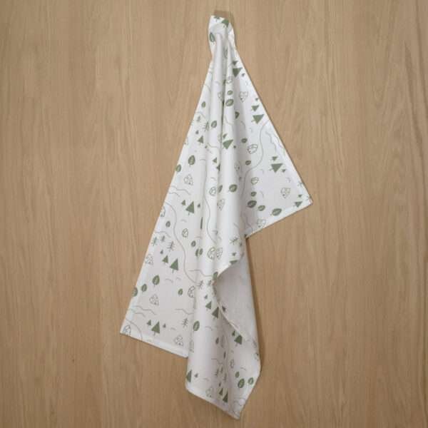 Tiny countryside design hanging tea towel in turf from hem and tassel