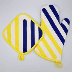 Yellow piano design mitt and hot pad from hem and tassel