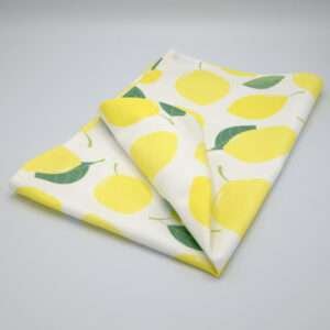 amalfi lemons design tea towel folded from hem and tassel