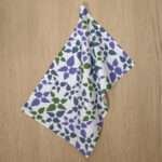 celebration design hanging tea towel in oil from hem and tassel