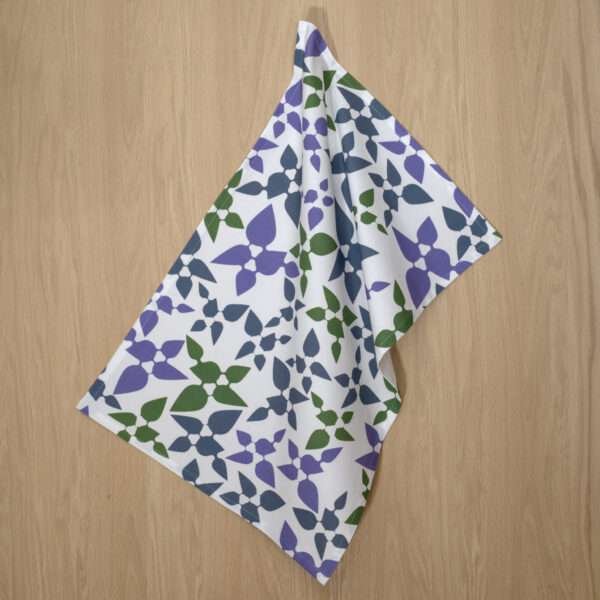 celebration design hanging tea towel in oil from hem and tassel