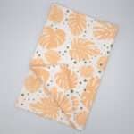 monster ah design buff and turf tea towel flat folded from hem and tassel
