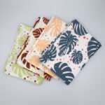 monster ah design four tea towels fanned from hem and tassel