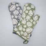 monster-ah design mitts fanned out. kitchen accessories from hem and tassel