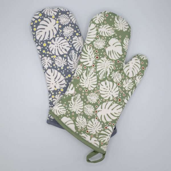 monster-ah design mitts fanned out. kitchen accessories from hem and tassel