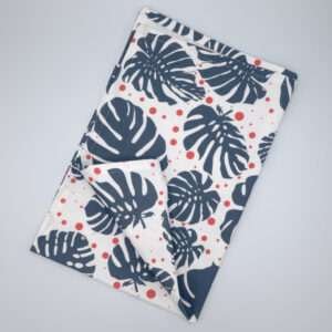 monster ah design oil and pink tea towel flat folded from hem and tassel