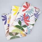 pollen up design three tea towels fanned from hem and tassel