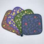 shy dragonfly design pot holders fanned out from hem and tassel