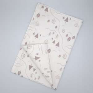 tiny countryside design tea towel in grey flat folded from hem and tassel