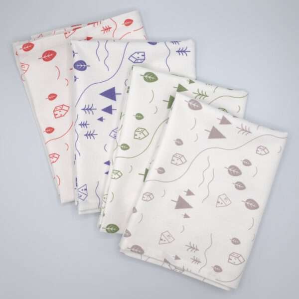 tiny countryside design tea towels fanned in four colors from hem and tassel
