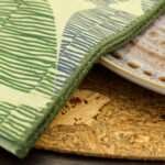 Celebration design Napkin in mint close up