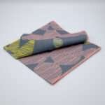 Celebration design dinner napkin in winter folded from hem and tassel