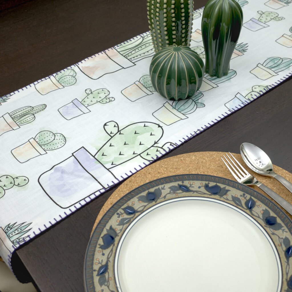 Desert Haze succulents design Runner LS looking down from hem and tassel with dinner setting