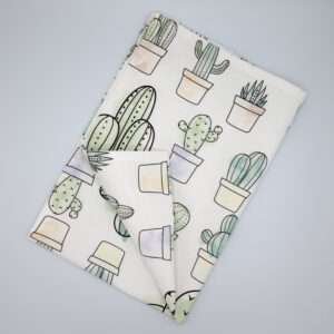 Desert Haze design tea towel flat folded from hem and tassel