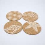Home by the sea design cork coasters set of four fanned out from hem and tassel