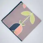 Lip TuLip design dinner napkins in oil flat folded from hem and tassel