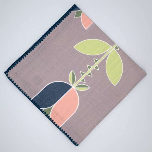 Lip TuLip design dinner napkins in oil flat folded from hem and tassel