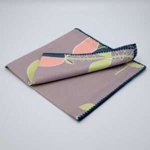 Lip TuLip design dinner napkins in oil folded from hem and tassel