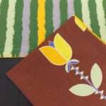 Lip tuLip design Napkins in orange with rough stripes runner by Hem And Tassel from hem and tassel