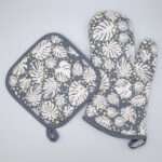 Monster ah design mitt and hot pad in oil.kitchen accessories from hem and tassel