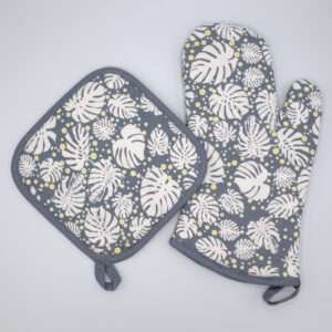 Monster ah design mitt and hot pad in oil.kitchen accessories from hem and tassel