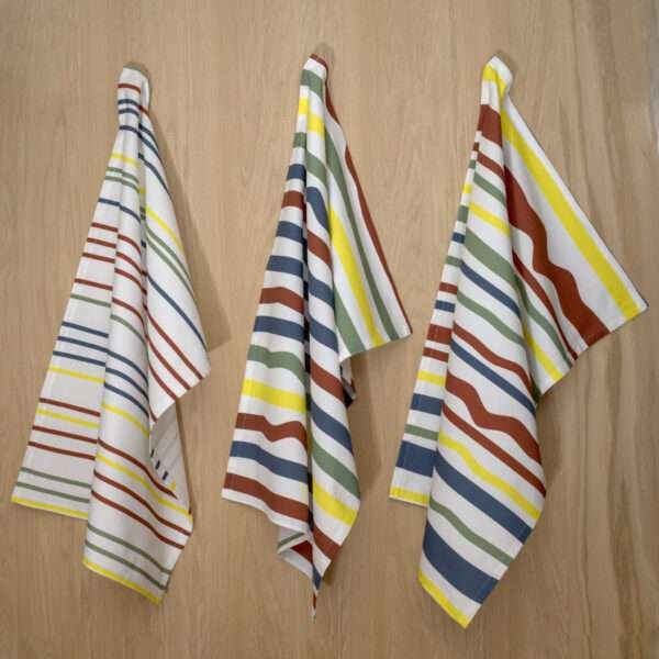 Not straight bold design set of three hanging tea towels from hem and tassel