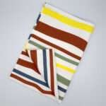Not straight design bold-broad tea towel flat folded from hem and tassel