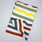 Not straight design bold-standard tea towel flat folded from hem and tassel