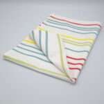 Not straight design medium-slim tea towel folded from hem and tassel