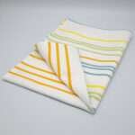 Not straight design mild-slim tea towel folded from hem and tassel
