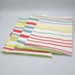 Not straight design set of three medium tea towels folded from hem and tassel