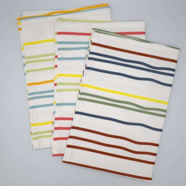 Not straight design set of three slim tea towels flat folded from hem and tassel