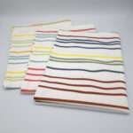 Not straight design set of three slim tea towels folded from hem and tassel