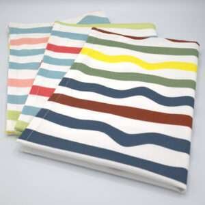 Not straight design set of three standard tea towels folded from hem and tassel