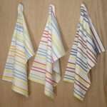 Not straight slim design set of three hanging tea towels from hem and tassel