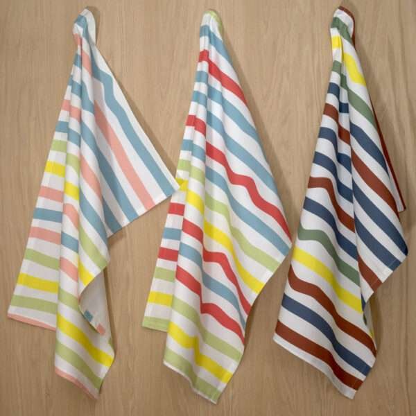 Not straight standard design set of three hanging tea towels from hem and tassel