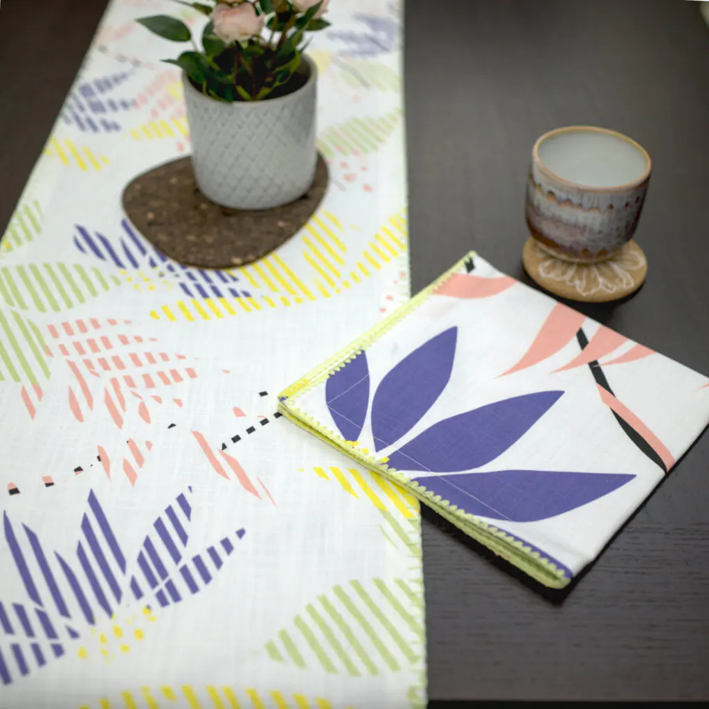 Pollen up design Dinner Napkin in yellow with pastels table runner LS from hem and tassel